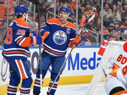 oilers fan flashes crowd unedited